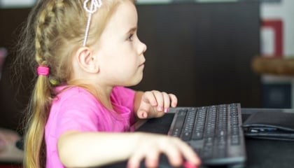 Little girl at laptop 